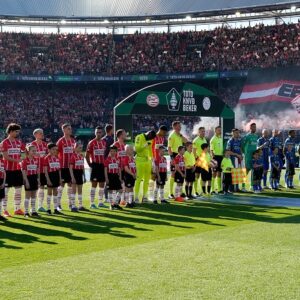(L-R) players of PSV, players of Ajax